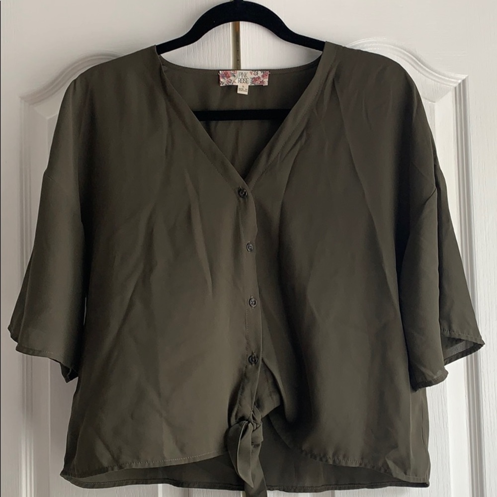 Loose fitting button down and tie bottom blouse